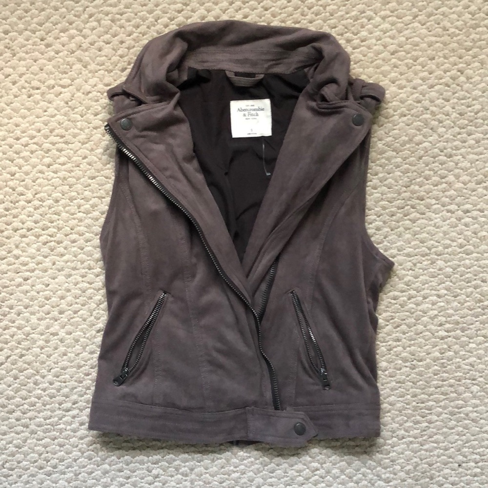 Zip up vest with pockets with soft outer material